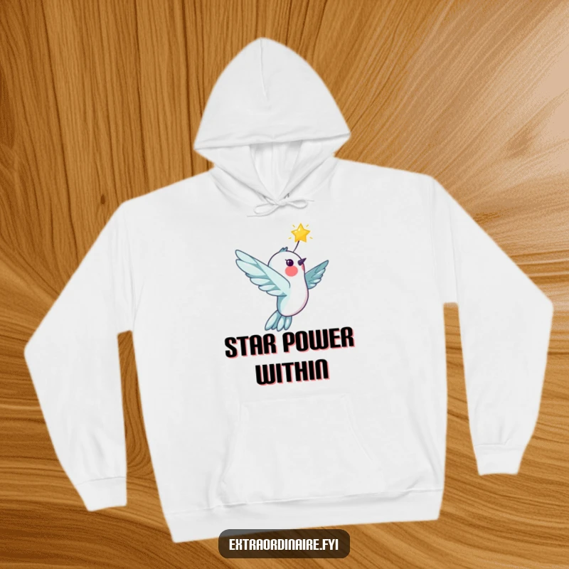 Funny cheerful hummingbird character flying with a bright star on a warm hoodie, evoking feelings of wonder and joy, a cozy apparel choice.