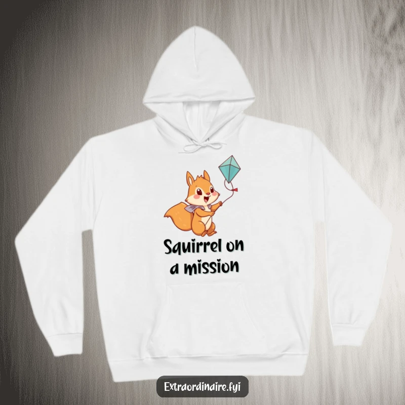 Funny Squirrel Hoodie: A brave squirrel character is depicted riding a kite high above the ground, looking exhilarated.