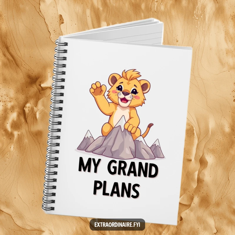 Funny lion cub adventure notebook, featuring a cub raising paws after conquering miniature mountains.