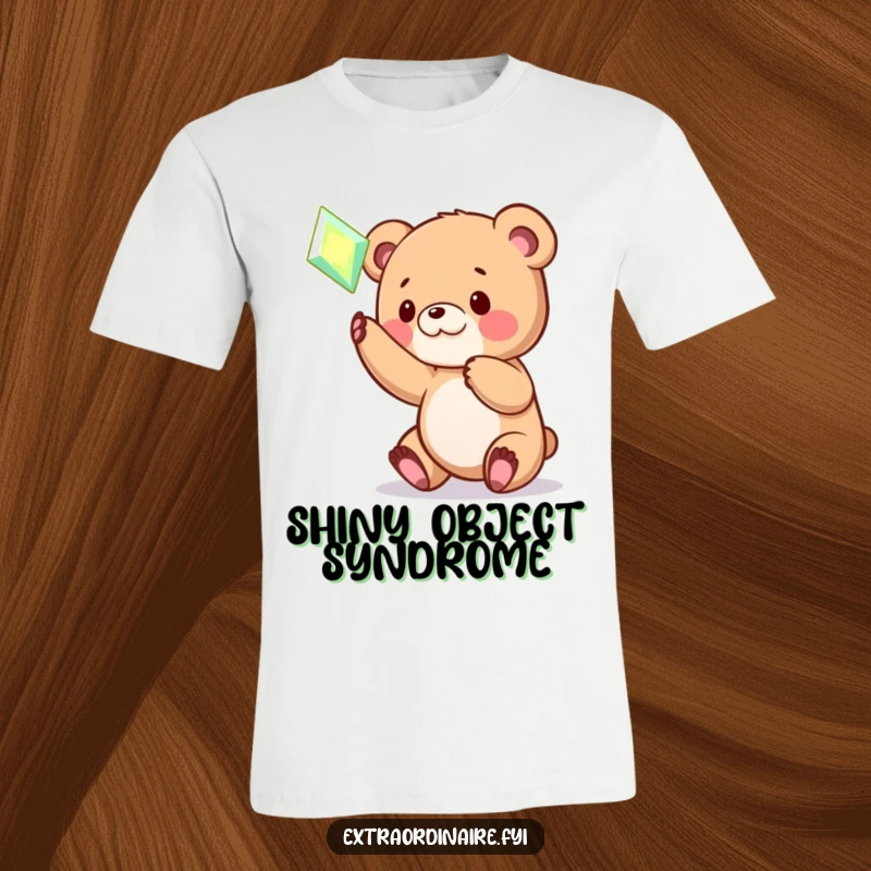 Funny Bear Cub T-Shirt: A playful bear cub is captured mid-batting at a bright, hovering, magical gem. Fun and whimsical design.